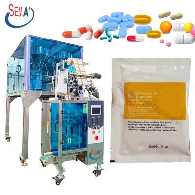 China Professional automatic beverage vitamin pill candy capsule small vertical tablet counting machine sachet packing machine for sale