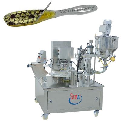 China Food Honey Spoon Packaging Machine Small Automatic 7g Honey Filling Sealing Packaging Machine for sale