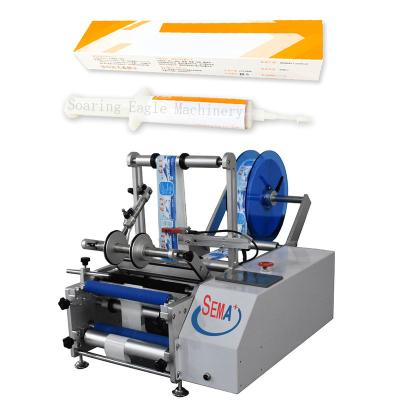 China Quality Assurance Medical Portable Labeling Machine Syringe Labeling Machine Horizontal Semi Automatic Labeling Machines for sale