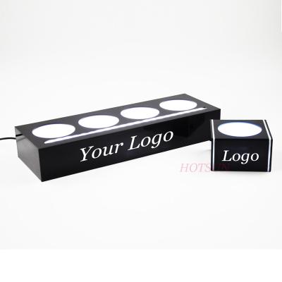 China Viable Custom Brand LED Wine Bottle Background Acrylic Bottle Display Glorifier Display for sale