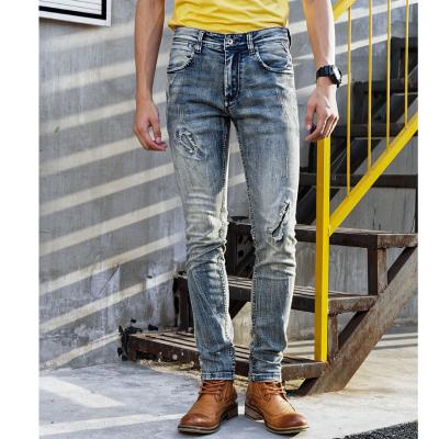 China Breathable Men's Casual Ripped Jeans Slim Denim Cotton Vintage Pants Hot Sale for sale