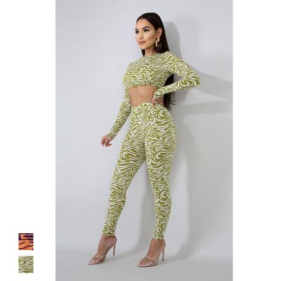 China Boho Printing 2021 Breathable Sexy Tracksuit Women Two Piece Outfit Suits Halter Bandage Tanks And Drawstring Ruched Long Pants Matching Sets for sale