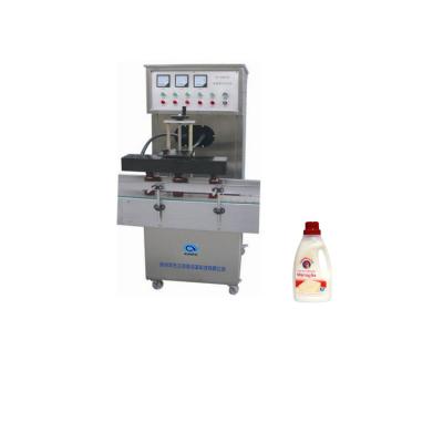 China Food Factory Supplied Plastic Containers Electromagnetic Induction Aluminum Foil Sealing Machine for sale