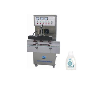 China Factory-specific Food Cup Tarpaulin Electromagnetic Induction Aluminum Foil Sealing Machine for sale