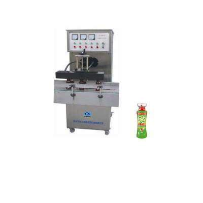 China Customizable Liquid Food Capsule Electromagnetic Induction Aluminum Foil Sealing Machine for sale