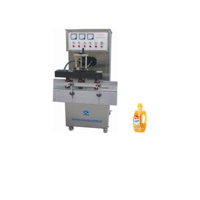 China Food Low Price Induction Cap Container Electromagnetic Induction Aluminum Foil Sealing Machine for sale