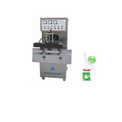 China Cheap Price Food Vacuum Packing Electromagnetic Induction Aluminum Foil Sealing Machine for sale