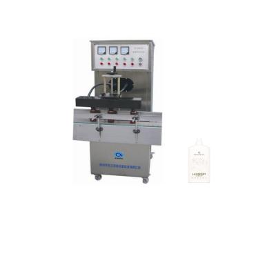 China High Quality Multifunctional Food Vacuum Electromagnetic Induction Aluminum Foil Sealing Machine for sale