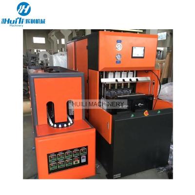 China Plastic Bottle Semi Automatic 4 Cavity Pet Blowing Machine for sale