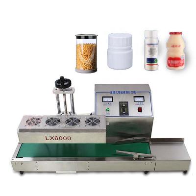 China Beverage Automatic Continuous Plastic Bottle Heat Sealing Electromagnetic Induction Aluminum Foil Sealing Machines for sale