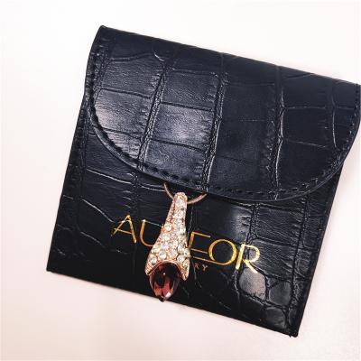 China Custom 8*8cm Black Leather Cover Button Eco-friendly Gift Jewelry Bags With Logo Printing Jewelry Packaging Gift Bag for sale