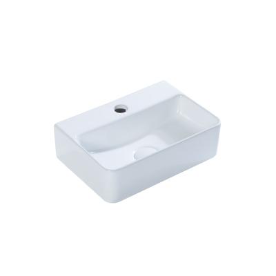 China Modern Wholesale High Quality Wall Hung Lavabo Art White Wash Basin Ceramic Bathroom Sink for sale