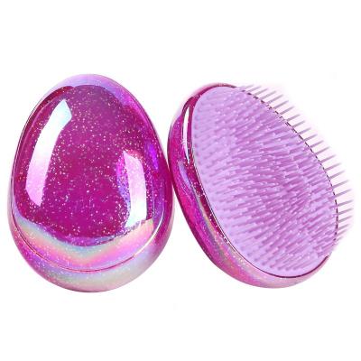 China Waterproof Glitter Egg Brush, Detangler Mini Travel Hair Brush Portable, Egg Shape Hair Comb Anti Static Detangling Knots for sale