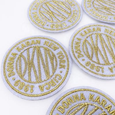 China Viable Custom Made Gold Thread Logo Hand Label Patch Embroidered Garment Accessories Embroidery Patch for sale