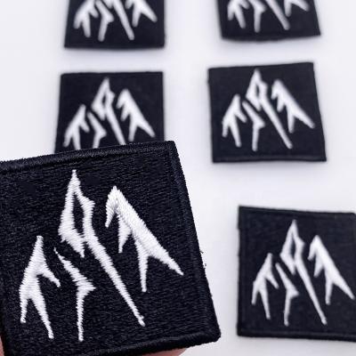 China Custom Embroidery Handmade Patch Iron On For Apparel Fabric Design Embroidered Technics Handmade Logo Brand Garment Embroidery Patch for sale