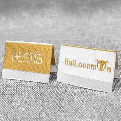 China Best Quality Labels Supplier Private Label Logo Design Embroidery Gold Selling Washable Yarn Woven Patch For Clothes for sale