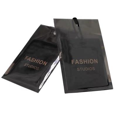 China Colored Copy OEM Logo Design Hangtag Label Black Seal Label PVC Plastic Bags Viable Design Hang Tag Label Special Fashion for sale