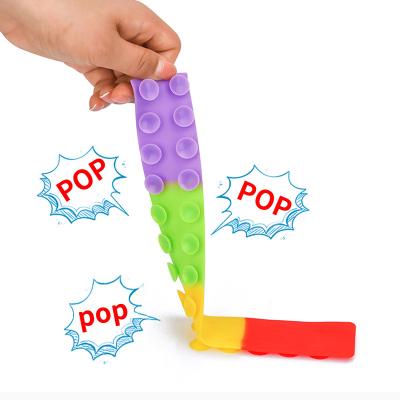 China Arrival Eco-friendly Material Cool Silicone Unlimited Squido Pop Sensory Pull Relaxation Toys Squidopop Restless Sucker Game Antistress for sale