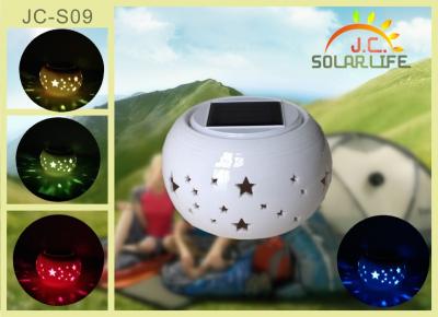 China Decorative Transparent Ceramic Hollow Solar Camping Lanterns Lights Color Changing for sale