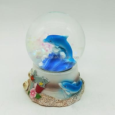 China Europe Water Globe Dolphin Family Figurine Glitter Mini Novelty Swimming Collectable Ornament Desk Decoration For Home Decor Snowglobe for sale