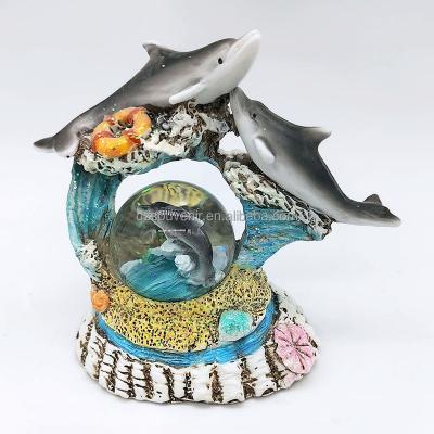 China Africa Double Dolphin World Coral Reef 45mm Beautiful Sea Wash Water Globe White Snow Globe With Gray Blue Resin Dolphin Figures for sale