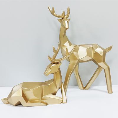 China 2pcs Nordic Home Decor Resin Deer Statues White Gold Reindeer Couple Sitting Deer Sculpture Christmas Decoration Black Standing Ornament for sale