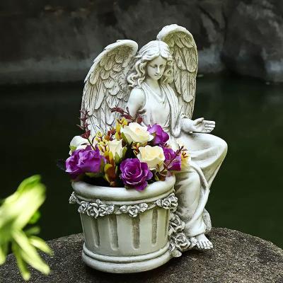 China Creative Europe Garden Decor Angel Planter Potted Roman Sculpture Roman Sculpture Resin Artifact Balcony Wing Angel Flower Pot Decoration for sale