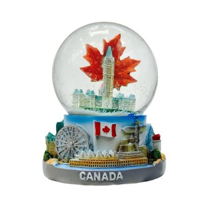 China Handmade Africa 3D Resin Water Globe Canada Landmark Vintage Scenes Japan Canadian Montreal Red Maple Leaf Canada Souvenir Globe for sale