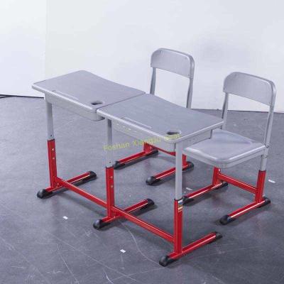 China Durable HDPE Metal Material Double Desk And Chair Set Customized Color for sale