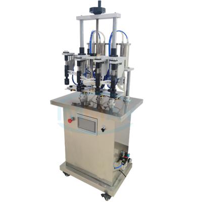 China Anticorrosive Food Glass Bottle Filler 4 Nozzles Vacuum Filling Machine Semi-automatic Perfume Filling Machine for sale