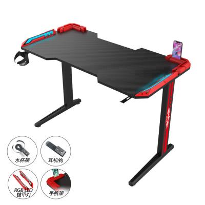 China Lightweight High Quality Modern Gaming Tables Led Cup Holder Earphone Stand Carbon Fiber Computer Gaming Desk for sale