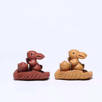 China Hot Stocked Sale Color Changing Tea Pet Ingot Rabbit Yixing Tea Ornaments Handmade Tea Set Accessories Wholesale Suppliers High Quality for sale