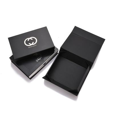 China Luxury Recycled Materials Product Magnet Flip Lid Cardboard Paper Black Wave Closure Folding Magnetic Apparel Packaging Box for sale