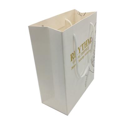 China 2022 New Design Recyclable White Paper Shopping Gift Bag Custom Wholesale for sale