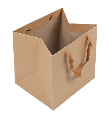 China Recycled Materials New Style Kraft Brown Eco - Friendly Paper Bags With Ribbon Handle for sale