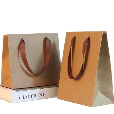 China Recycled Materials Personalized Design Shopping Tote Printed Luxury Gift Paper Shopping Bag Custom With Ribbon Handles for sale