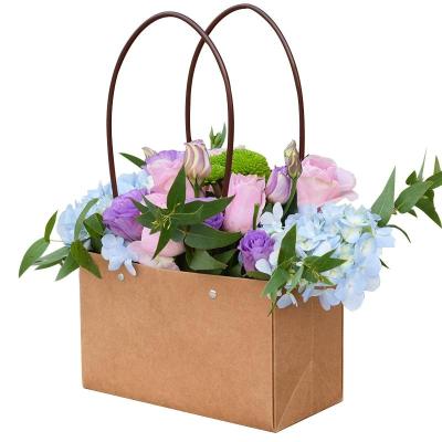 China Beautiful Material Design Kraft Paper Flower Recycled Paper Bag With Handle Florist Gift Packing Bag Box for sale