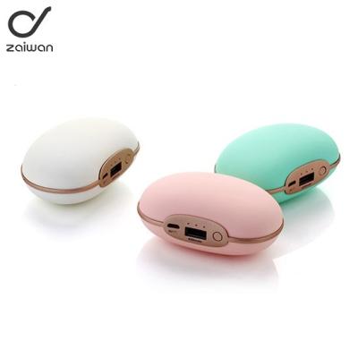 China 2018 New Convenient 3 in 1 4000mah Hand Warmer Portable Mobile Small Phone Charger Power Bank with Massager for sale