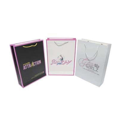 China Hair Package Customized High Quality Gold Foil Logo Finish Matte Ribbon Handle Gift Shopping Pink Paper Bags For Hair Extension Packaging for sale