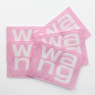 China Viable Wholesaler Logo Girl Pink Private Label Custom Fabric Cloth Label Tags Woven Label For Clothes for sale