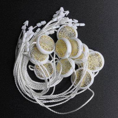 China 2021 Sustainable New Products Custom Hang Tags Plastic String Lock Clothes Hang Tags for sale