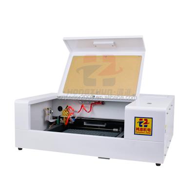 China Protect film cut laser film cutting machine phone protective film cutting front and back film 9h 10h anti explosion for sale