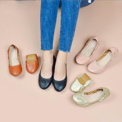 China Flat flat shoes women's round head ladies flat shoes new European and American style rivet roll shoes women for sale