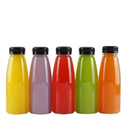 China Wholesale Food Grade Empty PET Cylinder 10oz Milk Fruit Juice Plastic Hot Beverage Bottle 300ml For Kids for sale