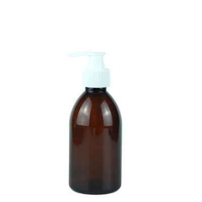 China Personal Care 300ml PET Brown Boston Plastic Round Luxury Shampoo Bottle 10oz Body Lotion Bottle With Pump for sale