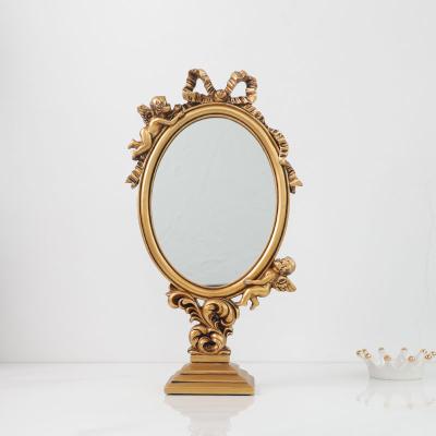 China Lighted Nordic Gold Retro Style Plated Antique Designer Home Table Stand Makeup Decorative Resin Mirror Frame for sale