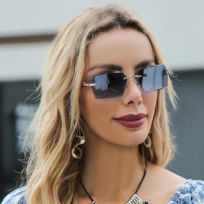 China Fashion Sunglasses 2022 High Quality Fashion Polygon Frame Rimless Sunglasses Style Small For Women And Men Gafas De Sol for sale