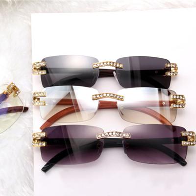 China Fashion Sunglasses Shape Women Small Rimless Square Rhinestone Diamond Frames Shades Rectangle Sunglasses Gafas De Sol for sale