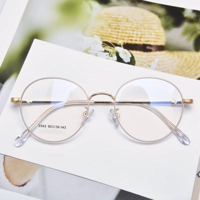 China Fashion sunglasses wholesale 2021 retro gold glass eyeglasses optical frame clear gold metal frames for sale