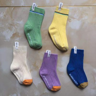 China Organic Cotton Solid Color Baby Alphabet Socks Kids Boys Girls Toddler Anti-slip Colorful Wholesale QUICK DRY Alphabet Socks for sale